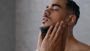 A man washing his beard