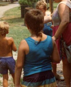 Child in the 1980s with a rattail