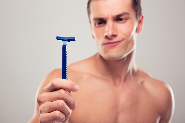 Man Holding Razor