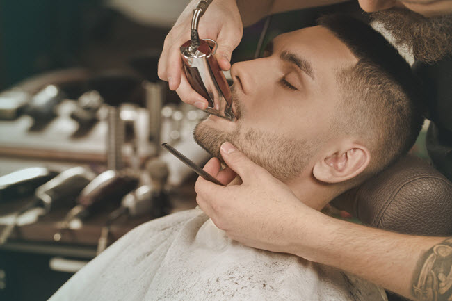 Man Getting Beard Trimmed