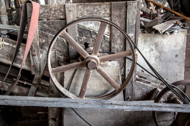 spin bike flywheel weight heavy vs light - old flywheel