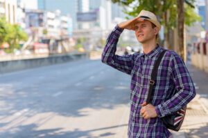 A man wearing a hat to protect the scalp from the sun