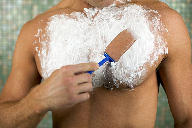 Man Shaving Chest